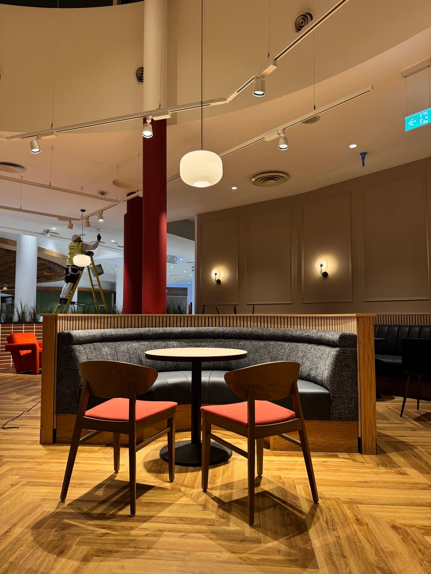 Completed Hillbillies restaurant seating area with wall sconces and recessed lighting installed by GES in Donaghmede, Dublin 13